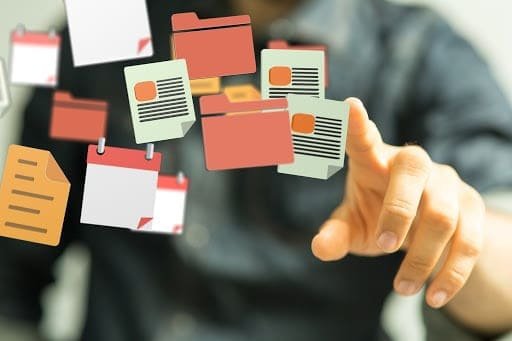 A person pointing to sticky notes with various naming conventions