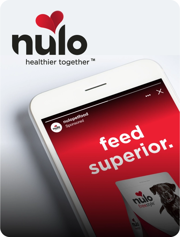 Nulo Pet Food logo next to a mobile device showing a social media ad for the company.