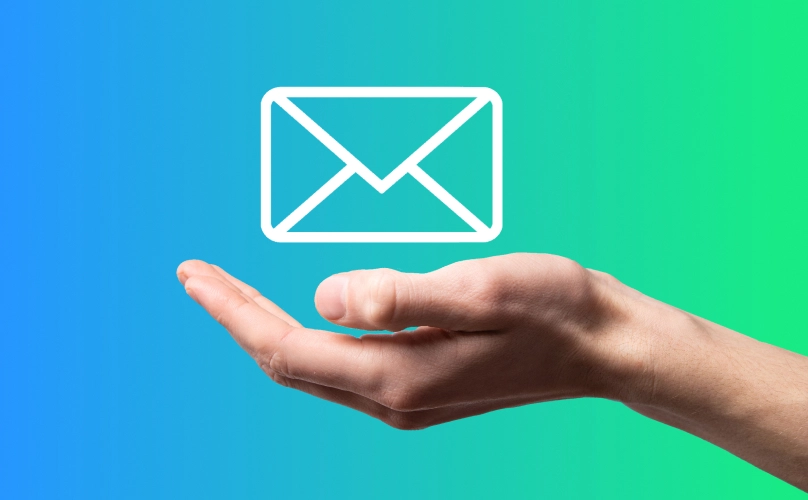 White icon of an envelope levitating above a hand.