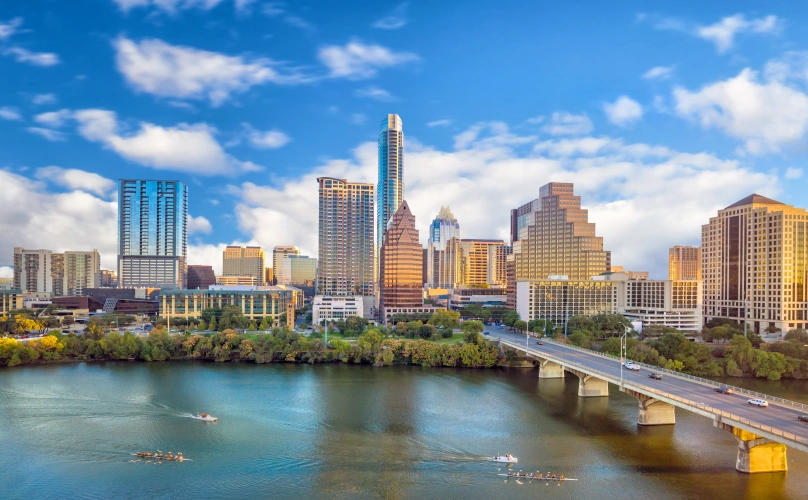 Wide view of the downtown Austin skyline from Lady Bird Lake.