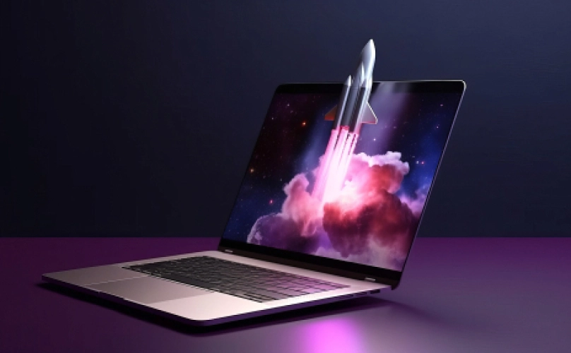 Rocket ship bursting from a laptop.